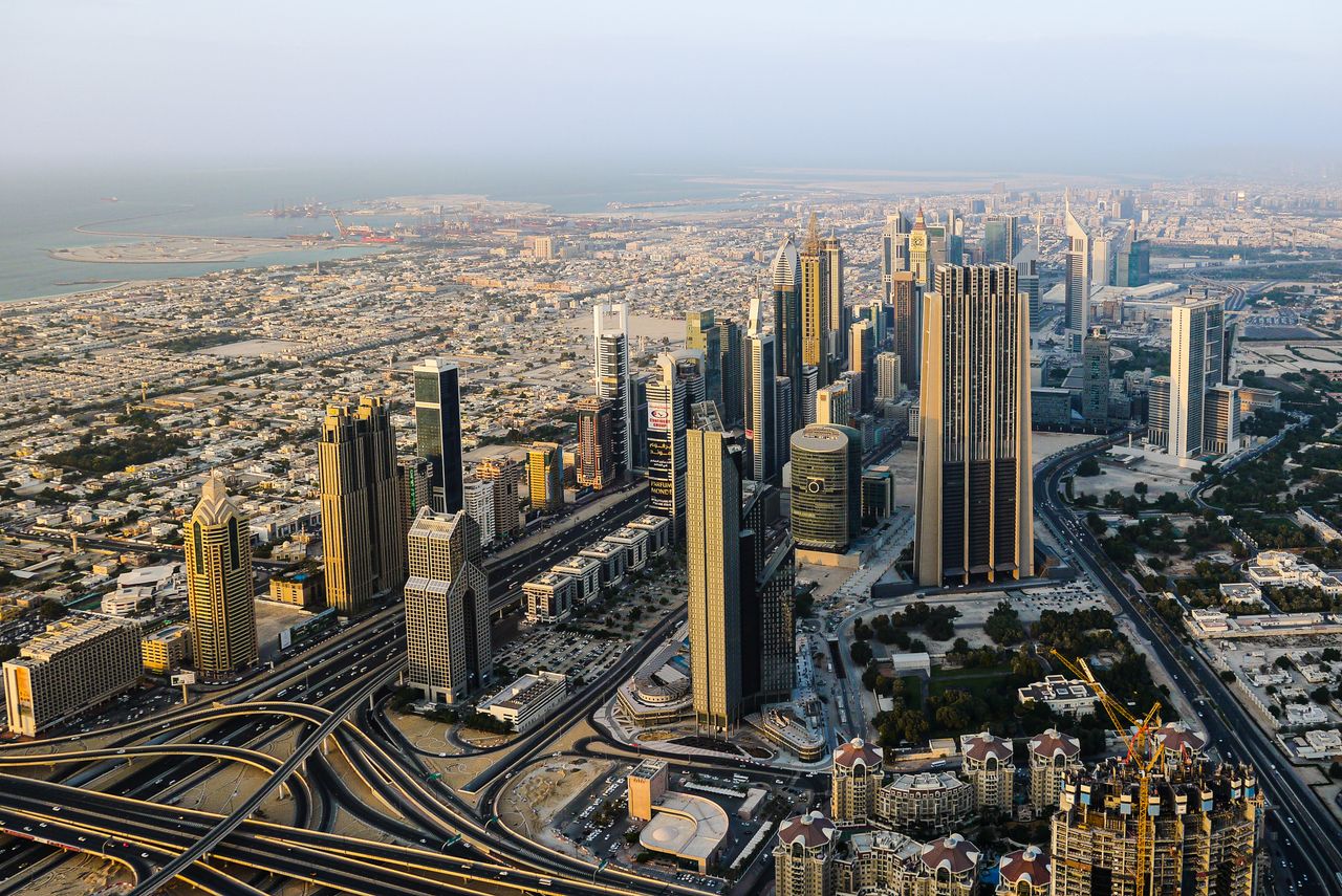 hero-services Breathtaking aerial view of modern skyscrapers in Dubais bustling cityscape.
